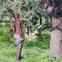 Rob 17 Hadzabe looking in t