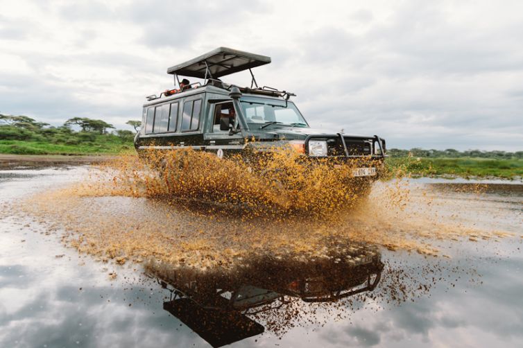 Kirurumu Serengeti Camp game drive through water