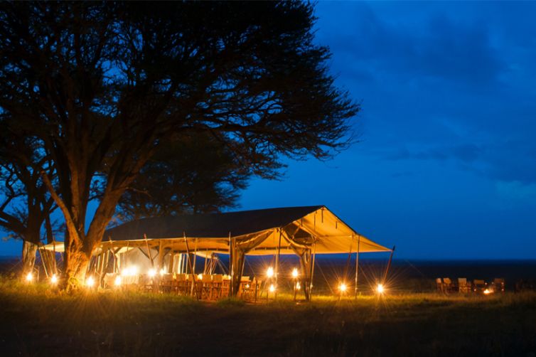 Serengeti Safari Camp central tent at night