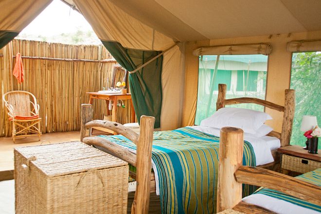 Laikipia Wilderness Camp Bedroom and Outside Bathroom
